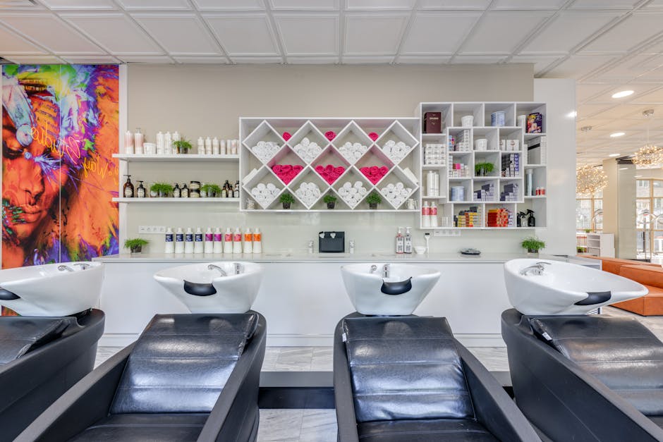 Luxurious beauty salon with stylish shampoo beds and colorful decor.