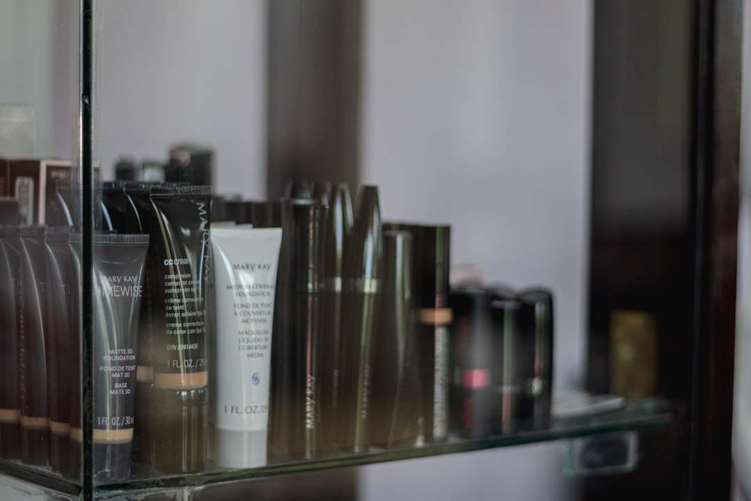 a shelf filled with lots of different types of skin care products