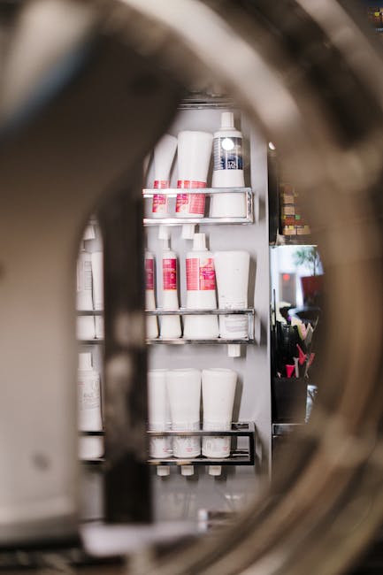 Close-up view of salon shelves showcasing various hair and beauty products.