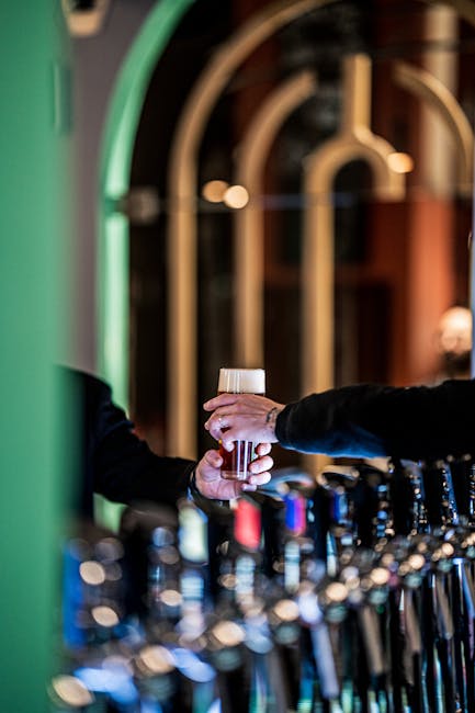 A vibrant nightlife scene in Luxembourg featuring a cozy bar with craft beer and social engagement.