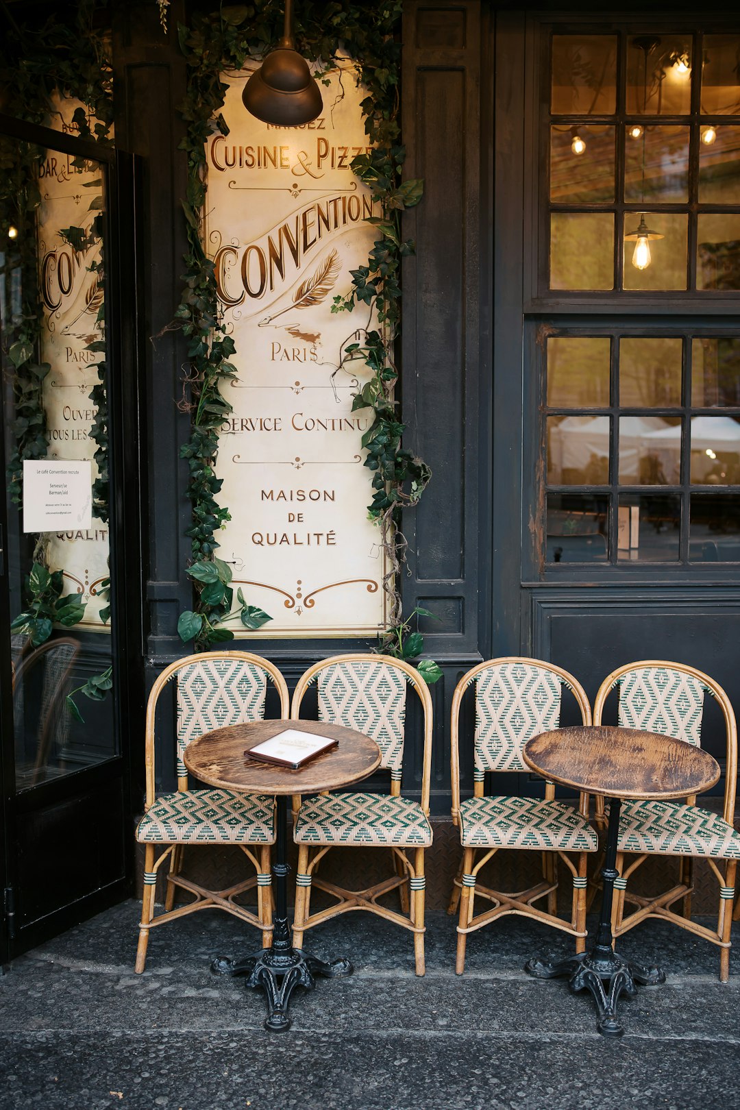 A couple of chairs sitting outside of a building