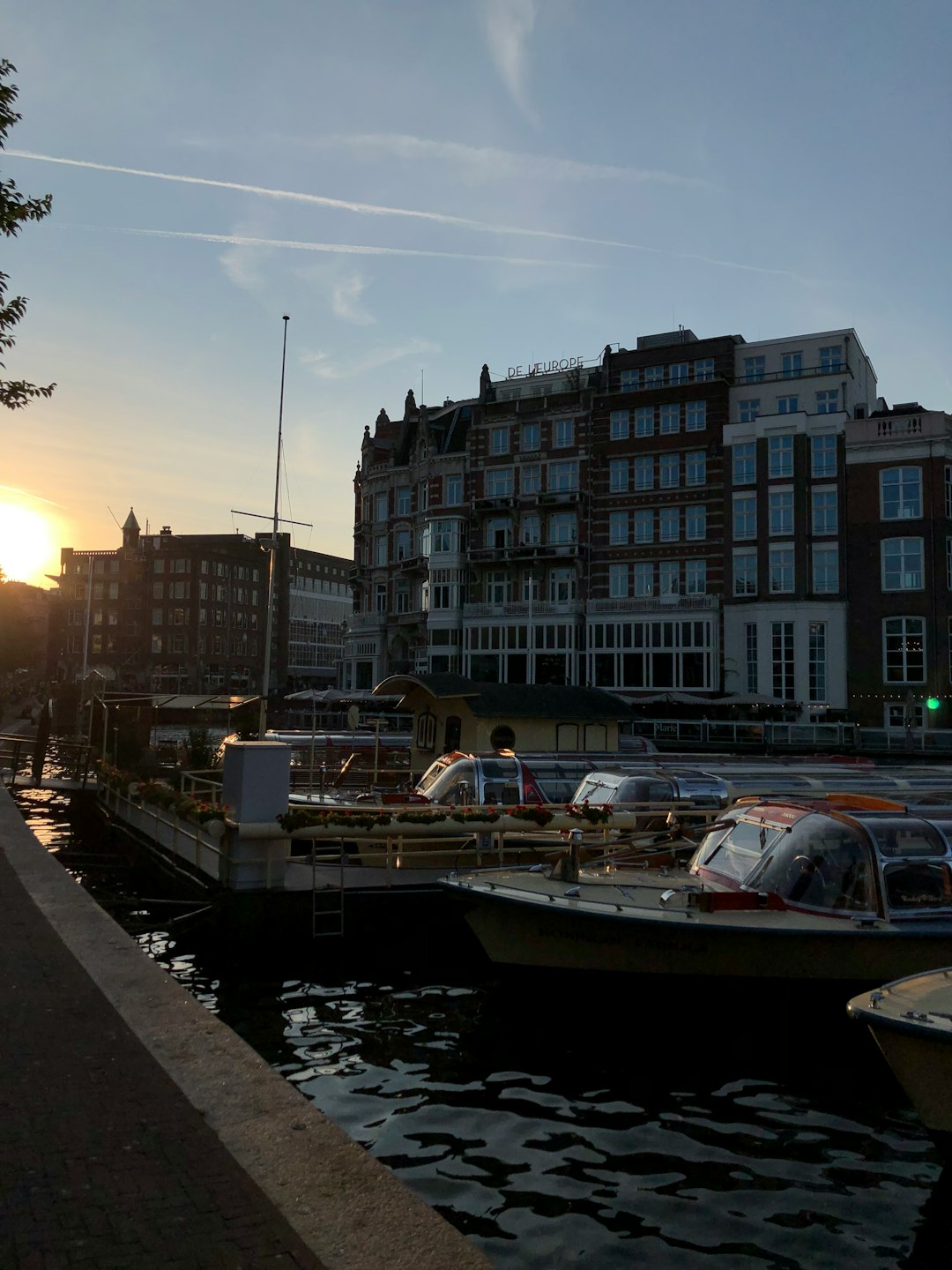 a group of boats that are sitting in the water