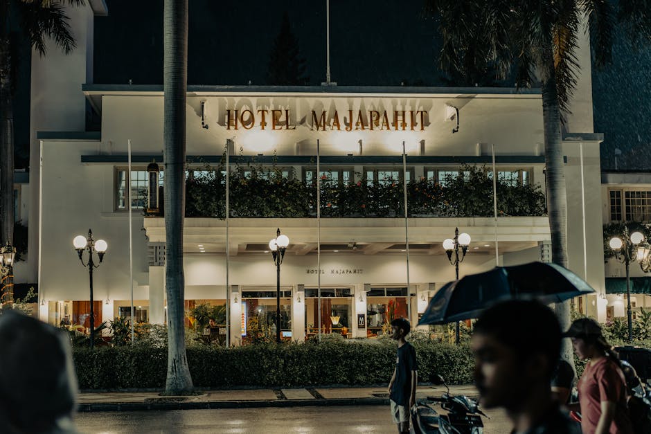 Stunning evening shot of Hotel Majapahit, a colonial landmark in Surabaya, Indonesia.