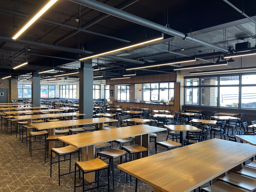 a large room with tables and chairs in it