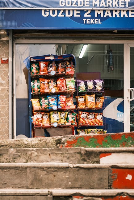 Vibrant display of snack bags outside a modern convenience store, ideal for stock photography.
